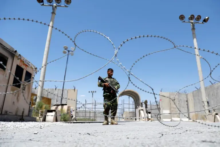 2021-07-02T000000Z_1593932096_RC2ACO95MREK_RTRMADP_3_AFGHANISTAN-1758433275