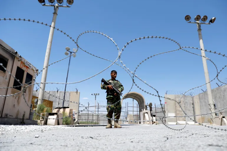 2021-07-02T000000Z_1593932096_RC2ACO95MREK_RTRMADP_3_AFGHANISTAN-1758433275
