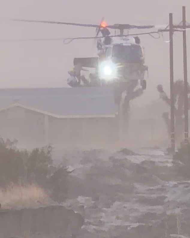 105011459-15412719-As_flood_conditions_worsened_in_San_Bernardino_County_officials_-a-8_1766645841662