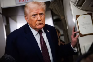 in-flight-u-s-president-donald-trump-takes-questions-from-the-members-of-the-press-aboard-air-6673984-300x200.avif