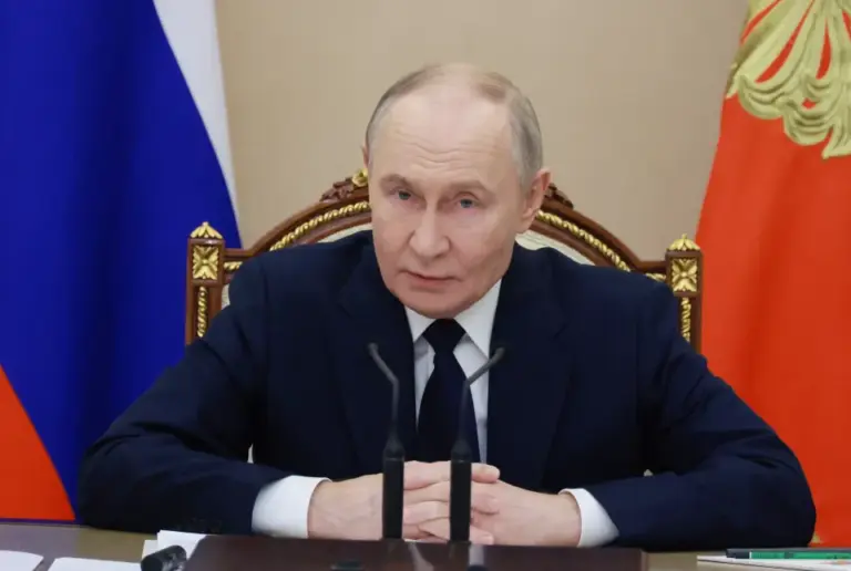 russian-president-vladimir-putin-chairs-1048418532