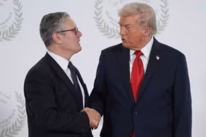us-president-donald-trump-greets-britains-prime-minister-keir-starmer-during-a-summit-on-gaza-6682270-300x200.avif
